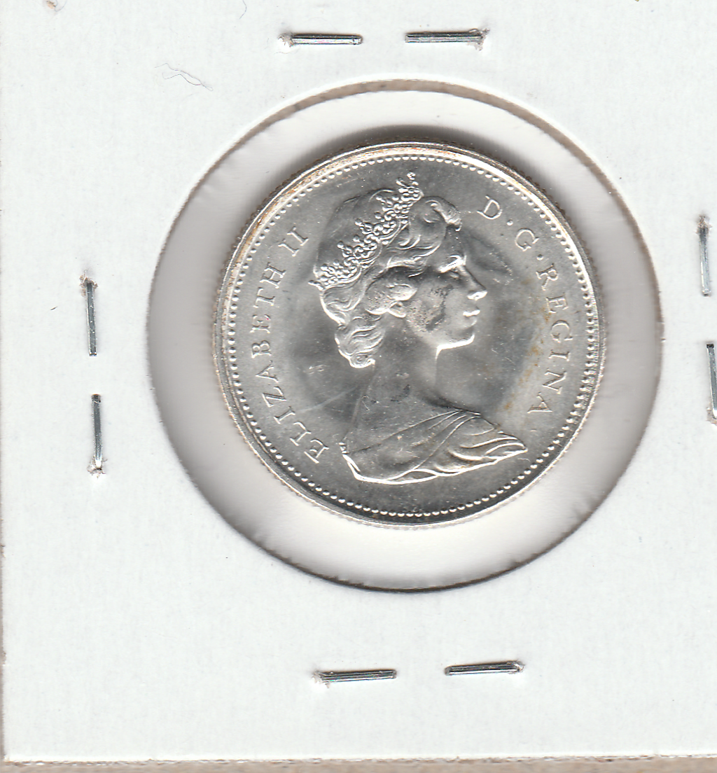 picture of the front of a 1967 Canadian centenial silver dollar